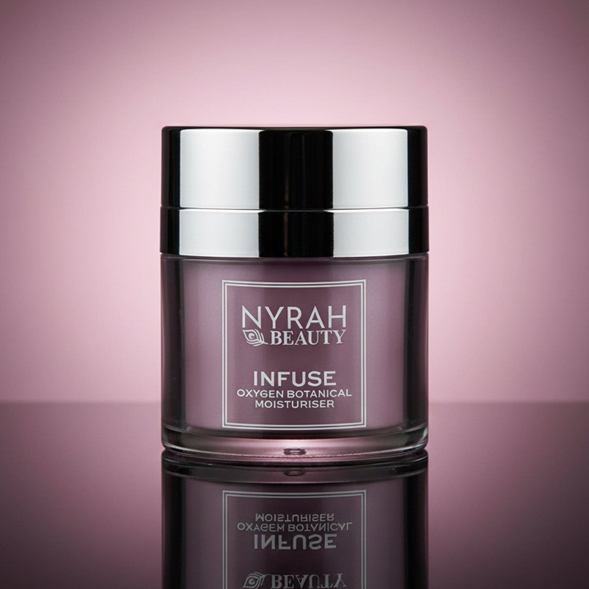 Nyrah Beauty skincare jar on a pink gradient background