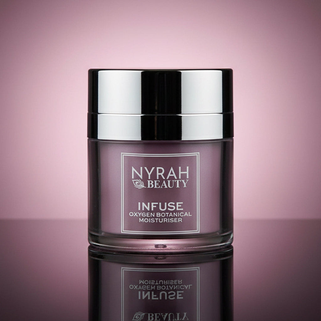 Nyrah Beauty skincare jar on a pink gradient background